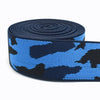 Dark blue and black camouflage elastic stretch ribbon rolled up for sewing and craft projects