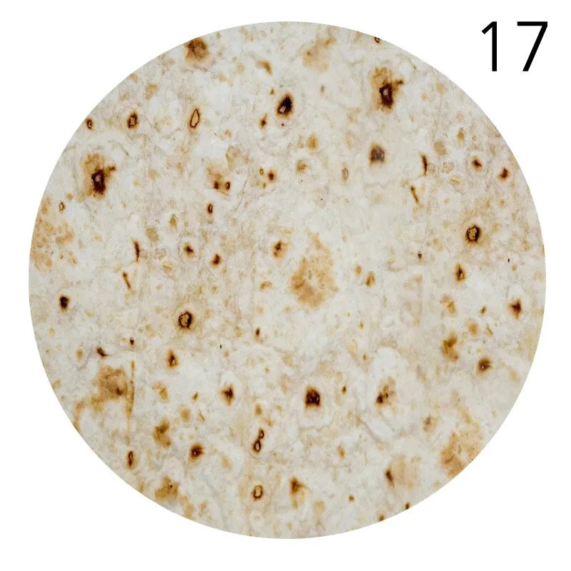 A circular image showing a light-colored, textured fabric with brown stains and a number 17 in the upper right corner.