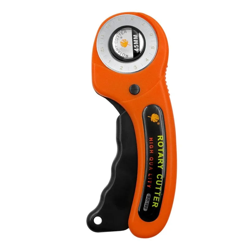 An orange rotary cutter tool with a circular blade guide and black handle.