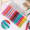 A collection of precision aluminum crochet hooks in various colors and sizes laid out on a white background.