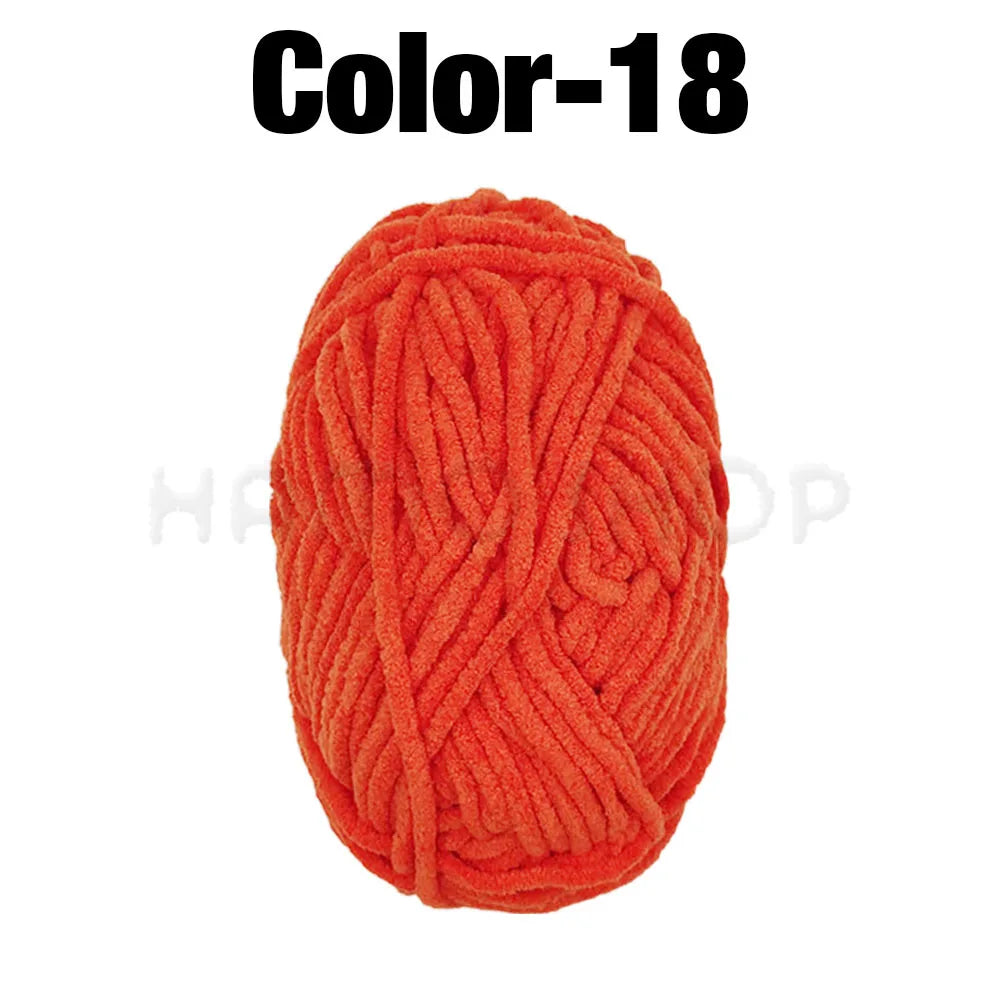 A ball of bright orange Color-18 chenille yarn for crafting.