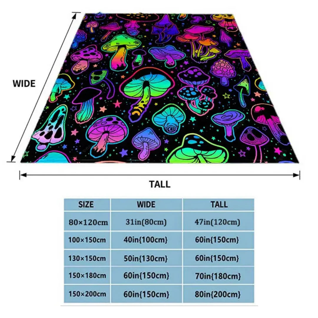 A colorful mushroom pattern flannel throw blanket displayed in a triangular shape.