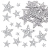 A collection of silver glitter star iron-on patches for clothing repair and decoration.