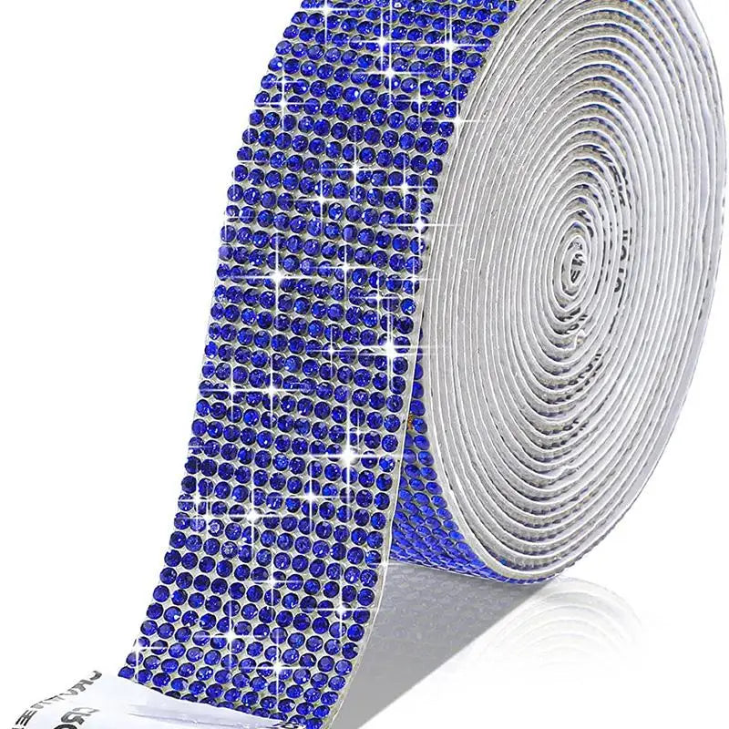 Blue crystal rhinestone sticker ribbon with diamond trim rolled up for crafting and decor