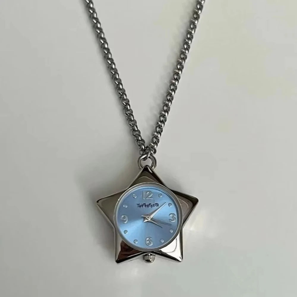 Silver chain necklace with a star-shaped pocket watch featuring a light blue face and silver hands.