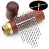 A set of multi-size hand sewing needles with a wooden storage case and a magnified view of the tips