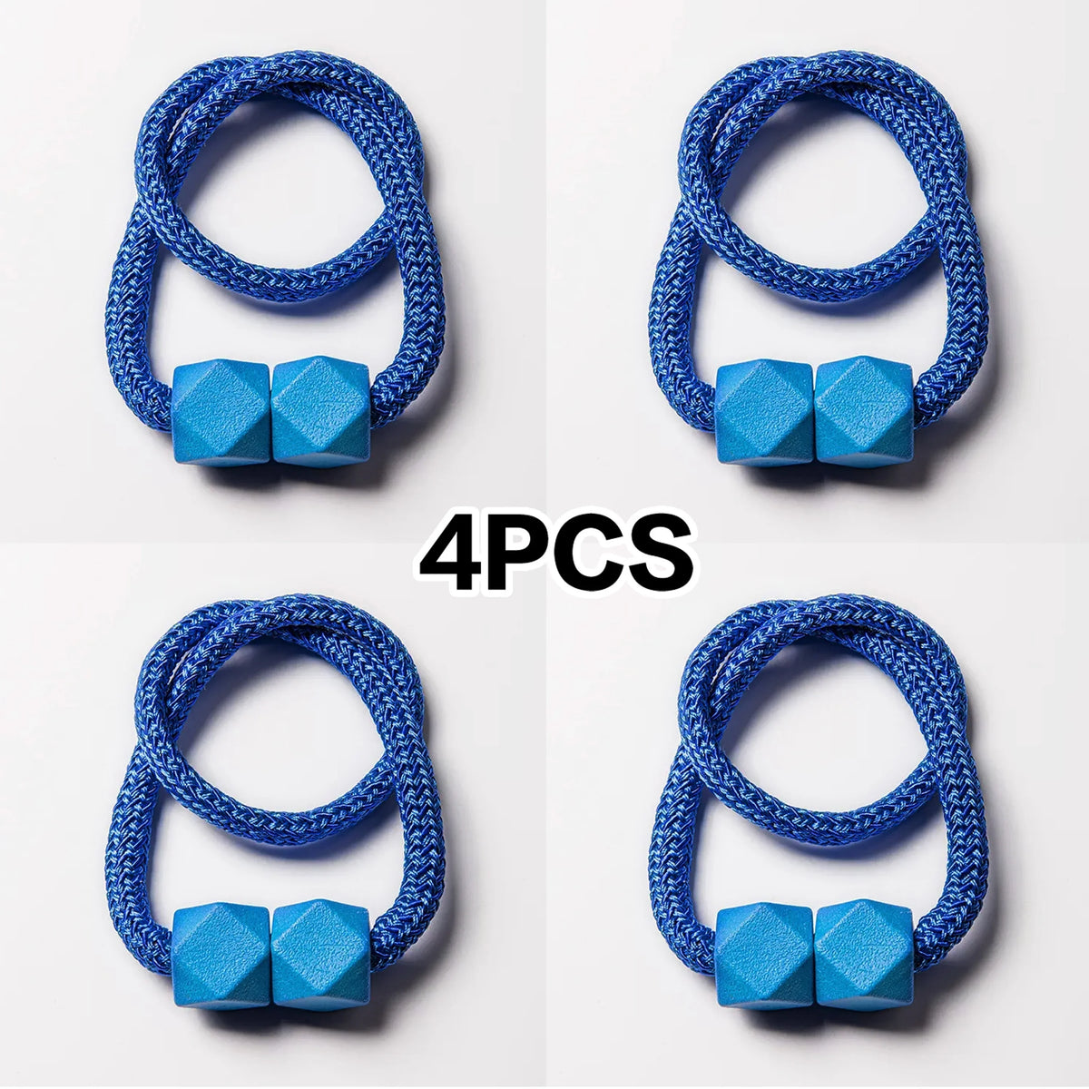 A set of four blue magnetic curtain tiebacks with cubic accents shown in various angles.