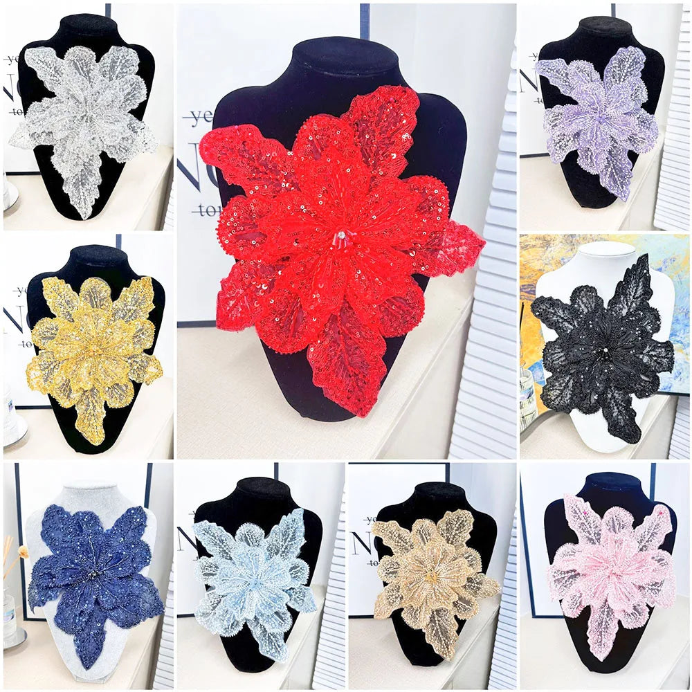A collection of 12 floral sequins and lace appliqués in various colors including red, purple, black, gold, silver, blue, and 