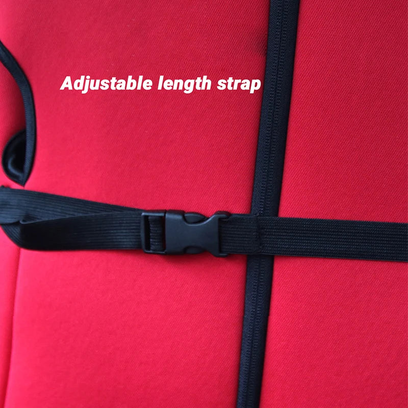 A close-up of a red baby car seat featuring an adjustable length strap and black webbing.