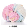 A ball of pink, blue, and white chunky acrylic yarn for knitting and crochet projects.