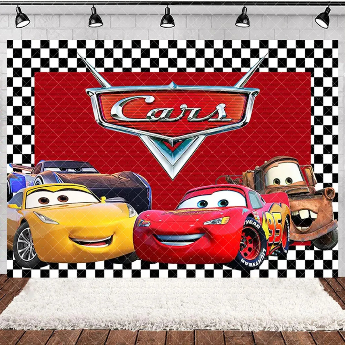 A Cars cartoon racing birthday party backdrop featuring Lightning McQueen and Mater on a checkered background.