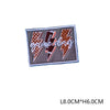 A rectangular embroidered patch featuring the text GAME DAYS in a stylized lightning bolt font on a gray fabric background.
