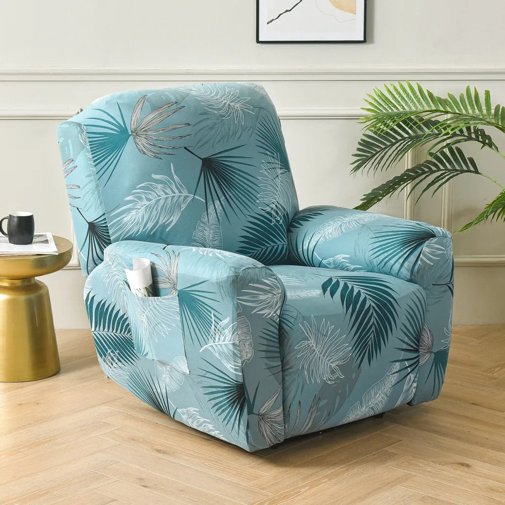 A teal and white floral print recliner sofa slipcover set placed in a bright room.