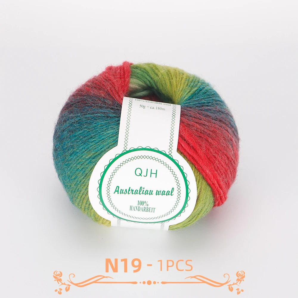 A ball of multi-colored wool yarn featuring shades of red, green, and blue, labeled for Australia waal.
