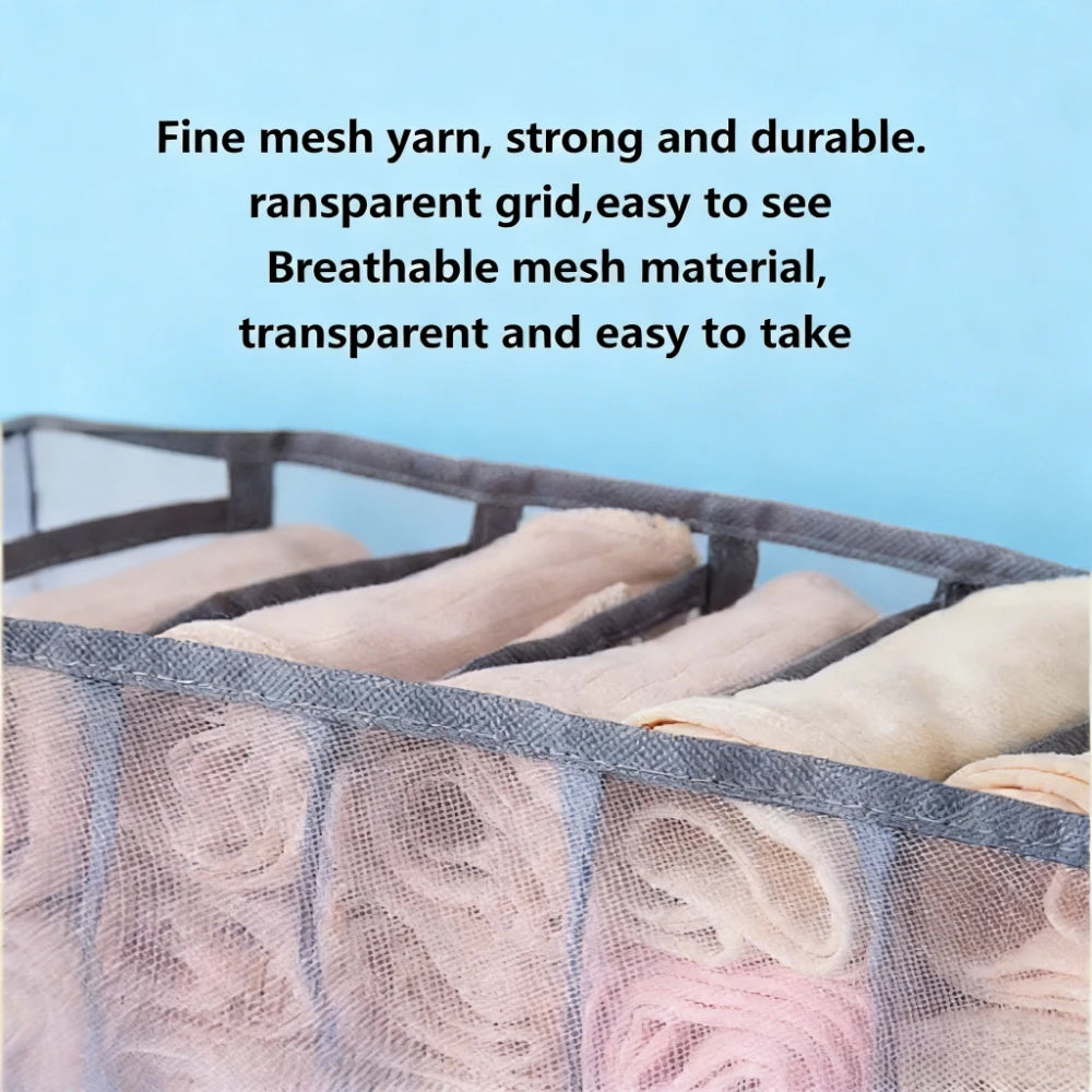 A close-up view of a fine mesh, transparent drawer organizer for storing undergarments and accessories.