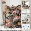 A dark flannel blanket featuring a collage of funny monkey prints and floral patterns.