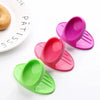 A set of colorful silicone oven mitts and silicone spatulas are displayed on a white background.