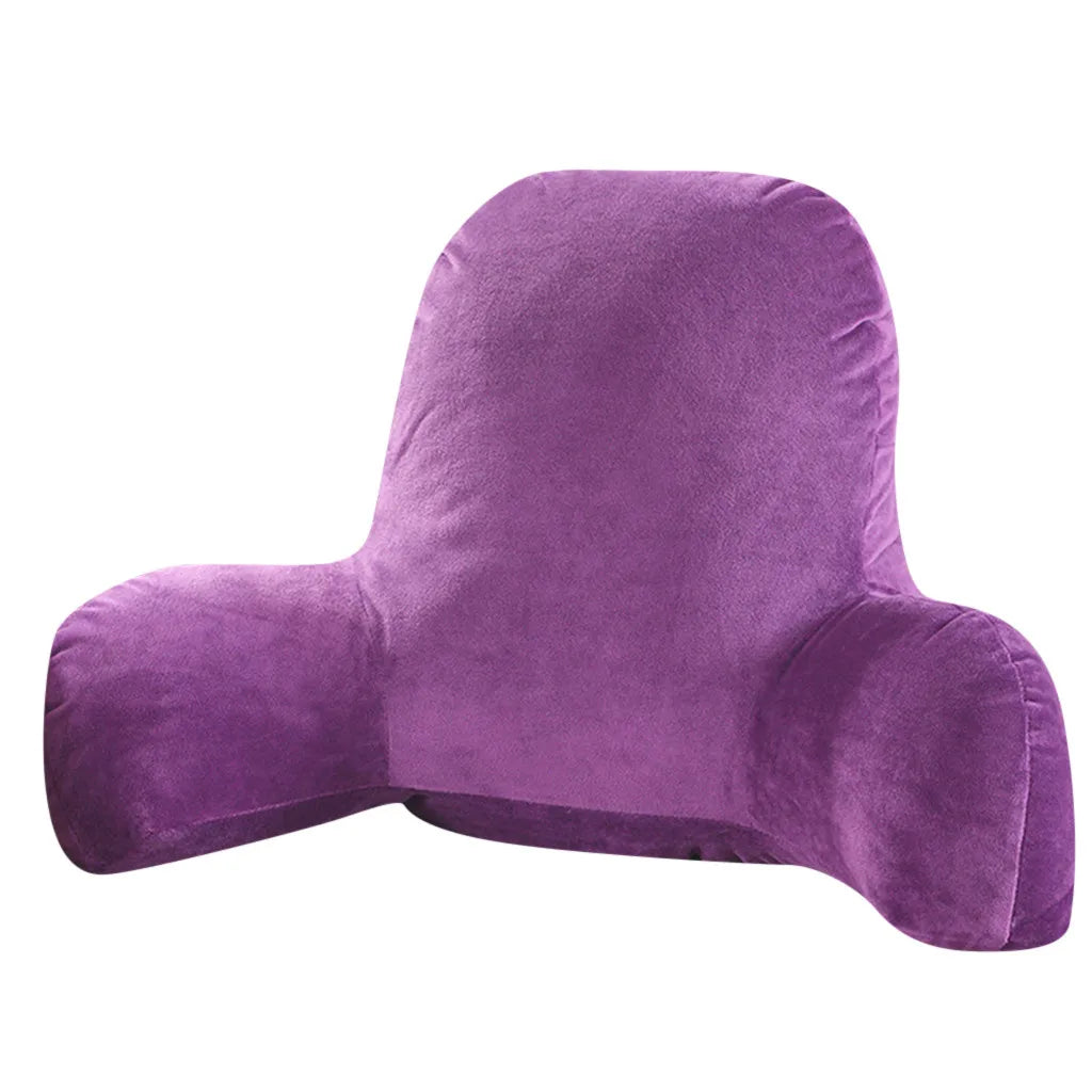 A purple plush lumbar support cushion with arms shown from the side.