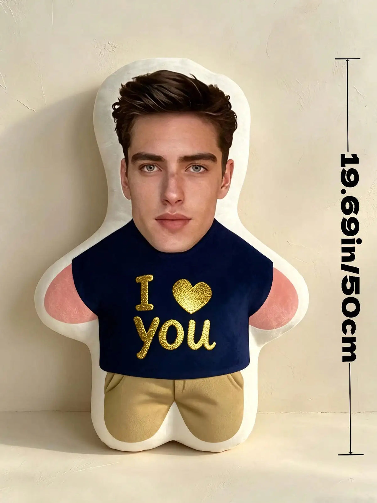 A personalized photo face pillow featuring a male face with the text I love you embroidered on the chest.