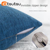 Close-up of a blue linen cushion cover showing an invisible zipper design on the side.