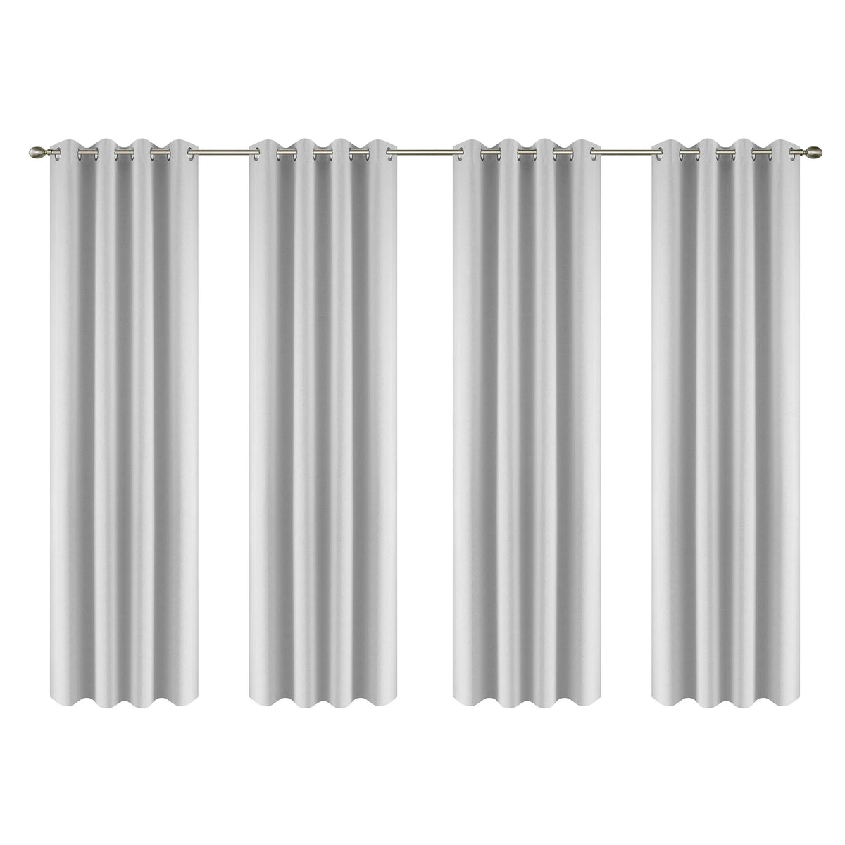 Set of four linen textured blackout curtains with grommet tops hanging on a rod