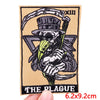 Embroidery patch featuring a skull wearing a top hat and holding a cane, with Roman numeral XIII above it.