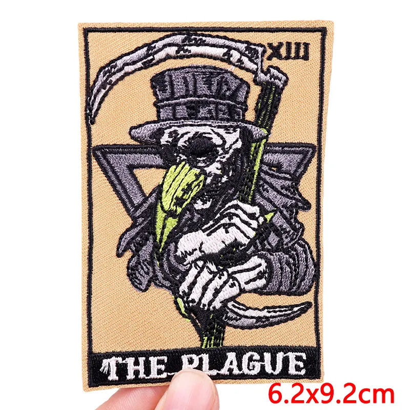 Embroidery patch featuring a skull wearing a top hat and holding a cane, with Roman numeral XIII above it.