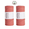 Two spools of pink hand-knitted cotton yarn for DIY crafting