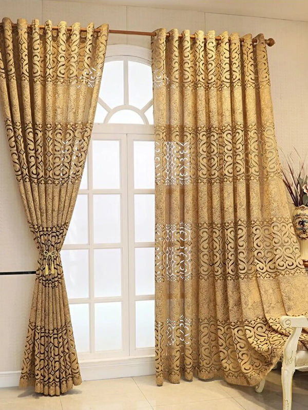 A pair of beige hollow perforated curtains hanging in a white window frame.