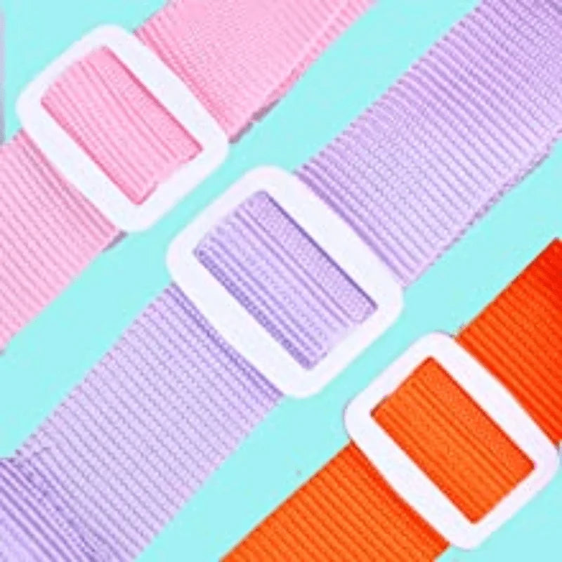 Pink, purple, and orange mesh wrist straps or bands for a bag.