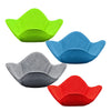 Three silicone bowl cozies in lime green, blue, gray, and red.