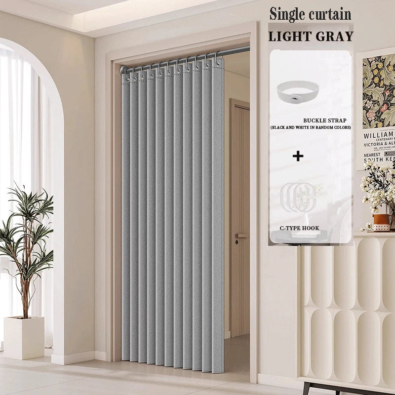 Single light gray pleated curtain hanging in a doorway for home decor