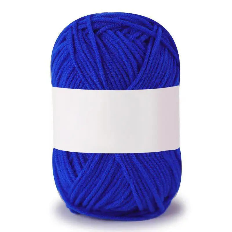 A ball of bright royal blue soft milk cotton knitting yarn