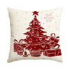 A red line drawing of a Christmas tree with gifts and snowflakes on a cream-colored pillow cover.