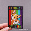 Embroidered patch featuring a fox face and the text CORGAY LOVE IS LOVE on a striped background