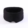 A black contoured travel sleep mask with a neck pillow design.