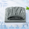 Gray cooling fitted sheet folded on a surface with features like cool to the touch, breathable wicking, and durable easy care