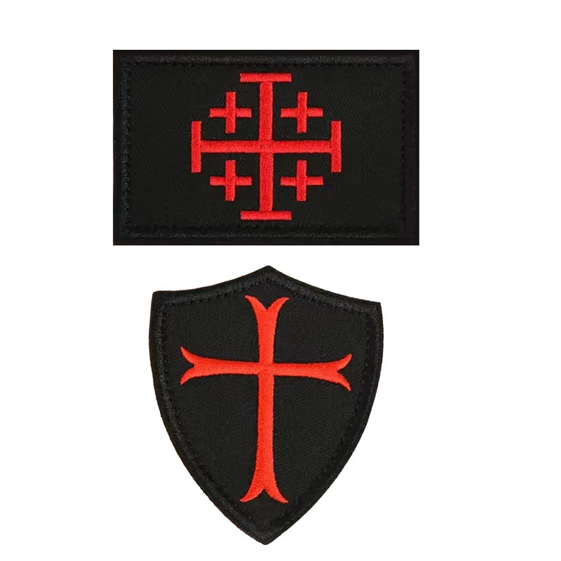 Black embroidered military cross shield patch with red detailing