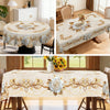 Elegant floral tablecloth with embossed edges displayed on a dining table.