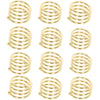 A set of elegant gold metal napkin rings for table decoration.