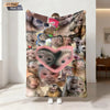 A flat print of various monkey faces on a fabric, displayed against a white wall.