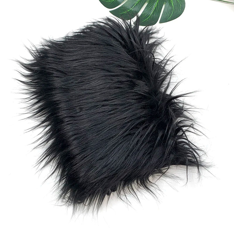 Black faux fur plush fabric used for sewing and crafting