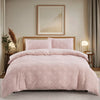 A pink boho tufted microfiber duvet cover set displayed on a bed with neutral decor.
