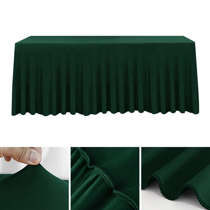 Dark green stretchable waterproof rectangle tablecloth draped on a table.