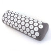 A dark gray acupressure relief mat and pillow set featuring white circular bumps.