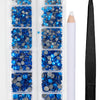 A clear plastic container holds various blue and silver crystal hot fix rhinestones and an applicator tool.