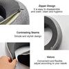 Close-up view of a gray memory foam travel neck pillow showing zipper design, contrasting seams, and velcro adjustment.