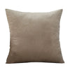 A square velvet throw pillow cover in a muted taupe color.