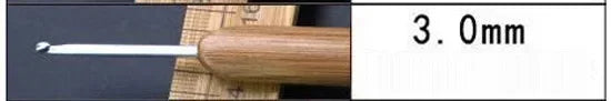A white and wooden crochet knitting needle with a 3.0mm size marking.