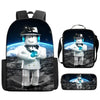 A black backpack featuring a cartoon character in a white school uniform standing on a rocky surface.